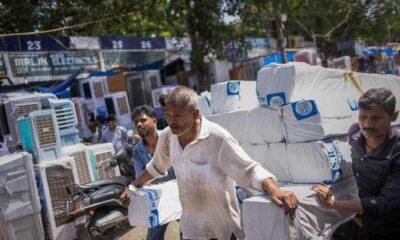 India battles power cuts as heatwave boosts electricity demand to record