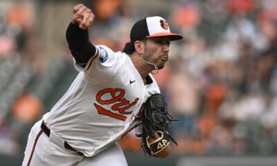 Orioles pitcher takes part in gender reveal as he walks off mound following relief appearance