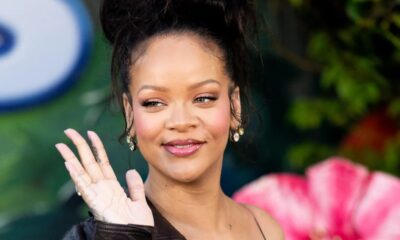 Rihanna embraces new tattoo given by children