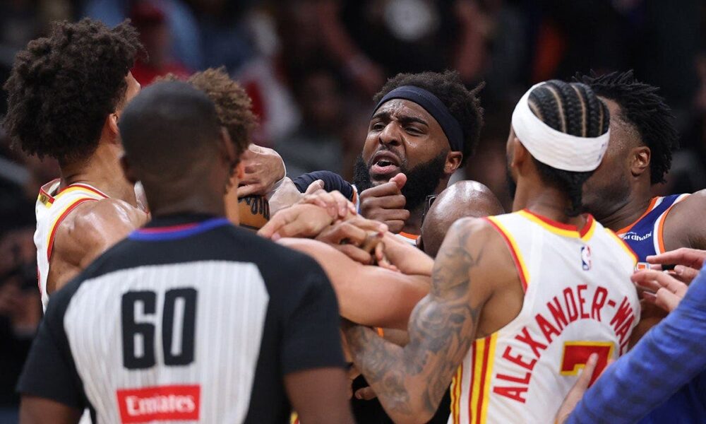 Two players ejected after scrum amid Knicks’ 50-point lead against Hawks sends referee crashing to the court